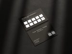 Double-sided minimal black barbershop loyalty card template mockup showing front with QR codes and reverse with stamp grid