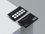 Close-up of the two QR code fields on the barbershop loyalty card template front showing booking and Instagram follow placement