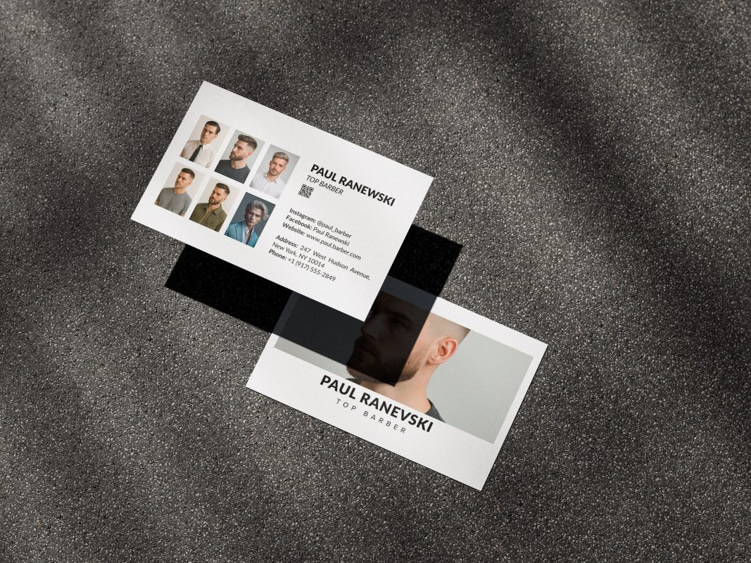 Two-sided white minimal barber portfolio business card mockup showing hero photo front and six-cut work grid with QR code reverse