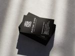 Reverse of the solo barber name card template showing large prominent QR booking code, name, barbershop name and contact details