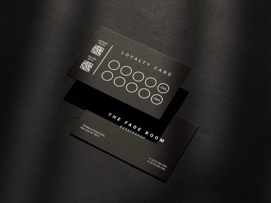 Double-sided minimal black matte barber reward card template mockup showing tiered visit discount system and dual QR codes