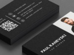 Close-up of minimal black freelance barber contact card template showing portrait photo, name and job title on the front face