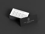 Black front face of the barbershop stamp card template showing logo placeholder area in minimal Canva design