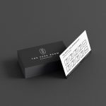 White reverse of the barbershop stamp card template showing clipper icon visit slots, 50% at visit 5 and free cut at visit 10
