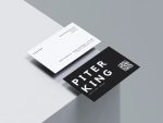 Front face of bold barber name card template showing large first and last name, QR code, and Men's Hair Beards descriptor on black background