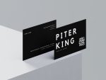 Back face of barber name card template showing name in smaller type with address, phone, website and men's haircuts beard grooming services text