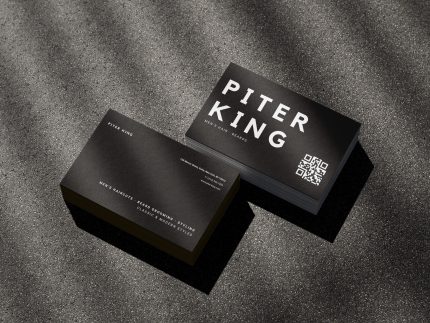 Side-by-side comparison of a generic shop-branded barber card with no individual name and the bold personal barber name card template