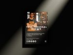 Printed A5 personal barber brochure template pinned to a gym or café noticeboard showing photo, QR code and Instagram handle