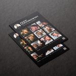 Printed A5 barber portfolio brochure template showing circular photo, work grid and QR code on a dark studio surface