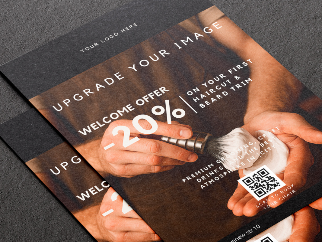 Close-up of A5 barbershop welcome offer flyer template showing the 20 percent discount promotion text and QR booking code