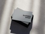 Use case graphic showing the ultra-minimal grey barbershop card template suits loft, concrete, and industrial aesthetic barbershops