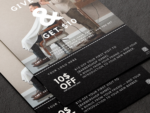Close-up of editable A5 referral card template for barbers showing the Give $10 and Get $10 offer text and QR code