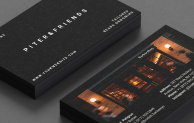 Premium barbershop business card featuring shop interior photo
