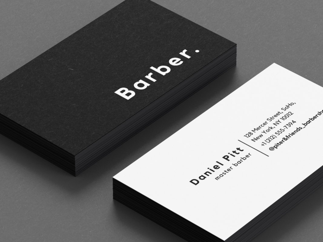 Text-only minimalist black and white barbershop business card