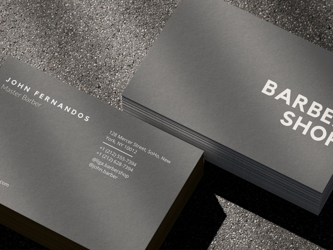 Loft-style barbershop business card in grey minimal design